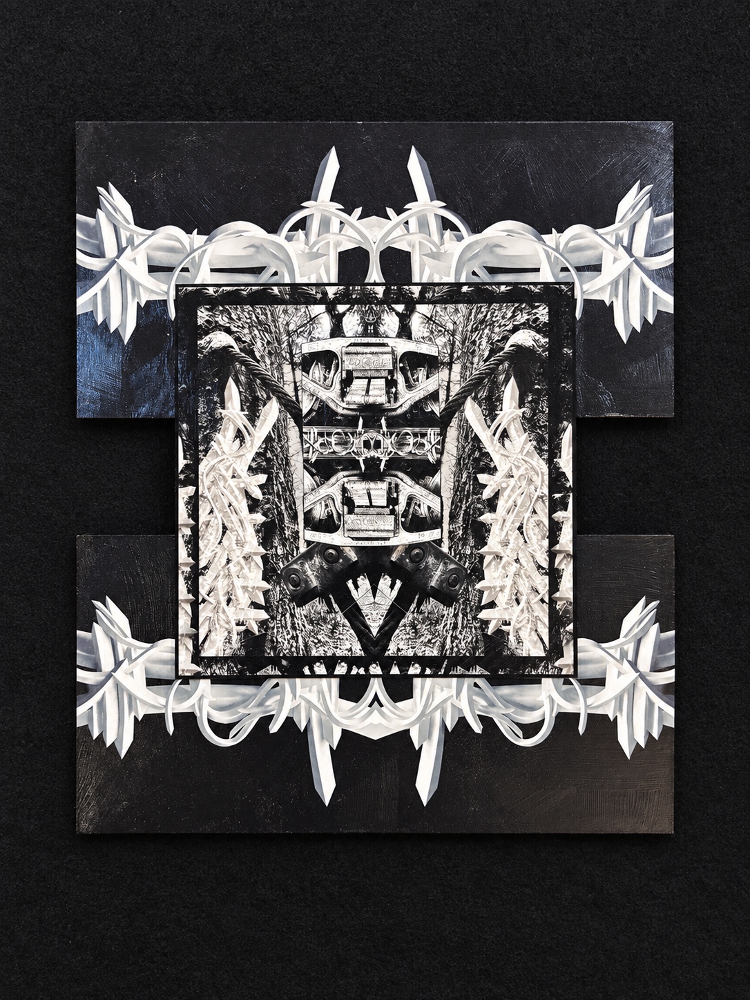 Layered monochrome construction combining tree textures, machinery, and white curling sculptural imagery